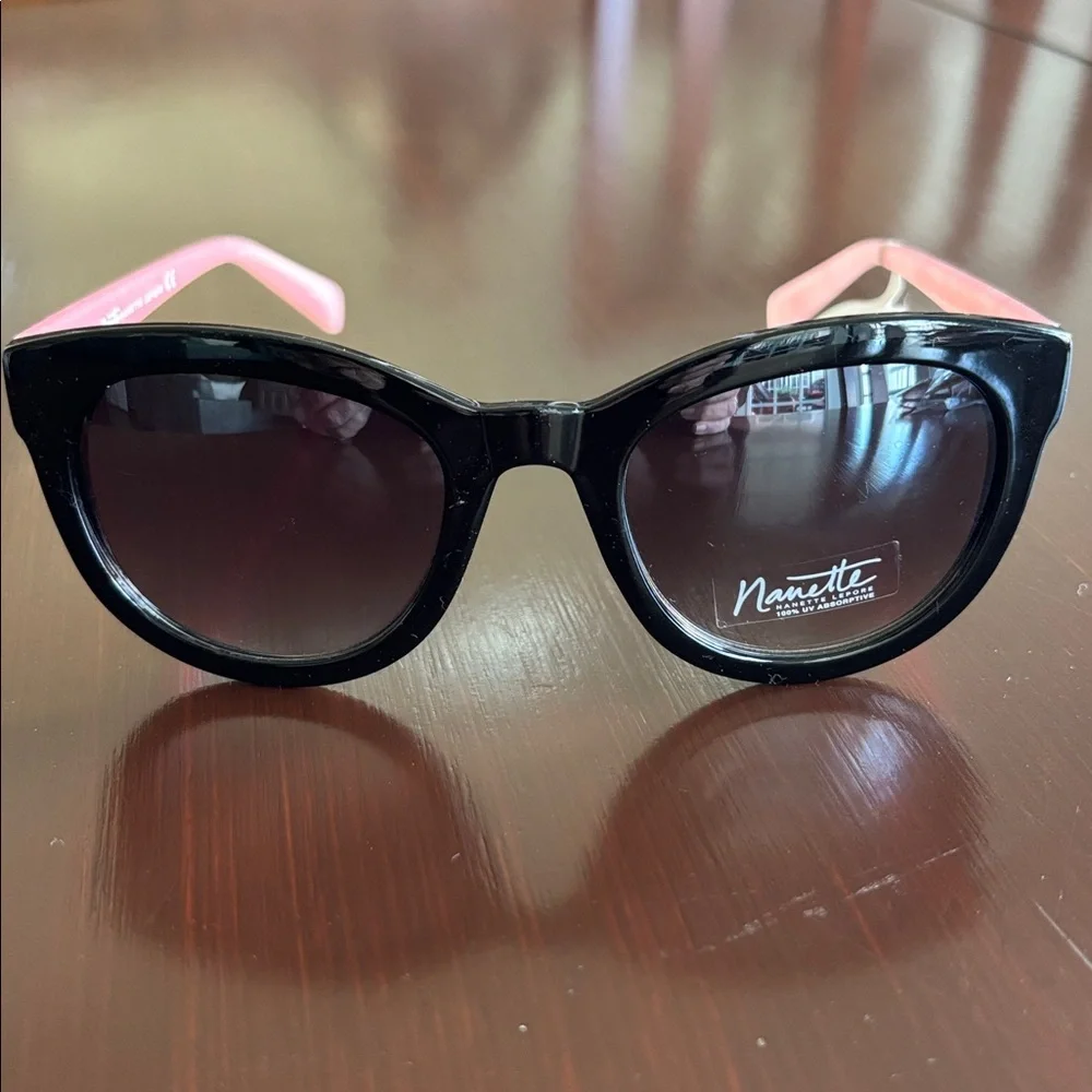 Nanette Lepore 100% UV protection,pearl pink arms,black round/square frame,NN157